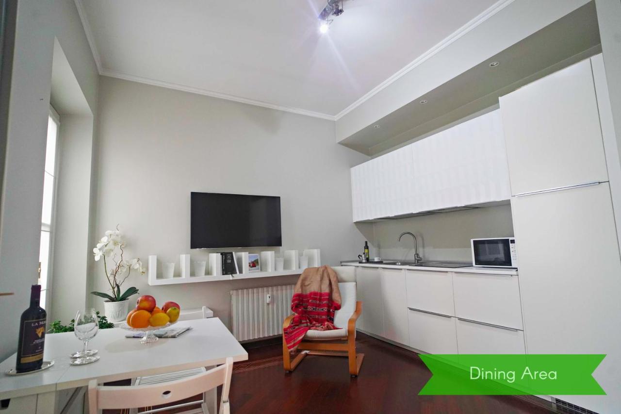Chic 1Bdr With Shared Terrace Steps From Duomo By Rentopolis มิลาน ภายนอก รูปภาพ