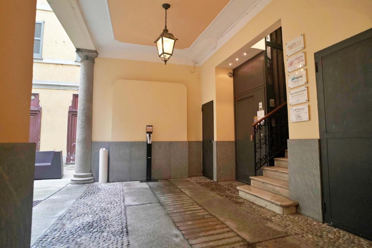 Chic 1Bdr With Shared Terrace Steps From Duomo By Rentopolis มิลาน ภายนอก รูปภาพ